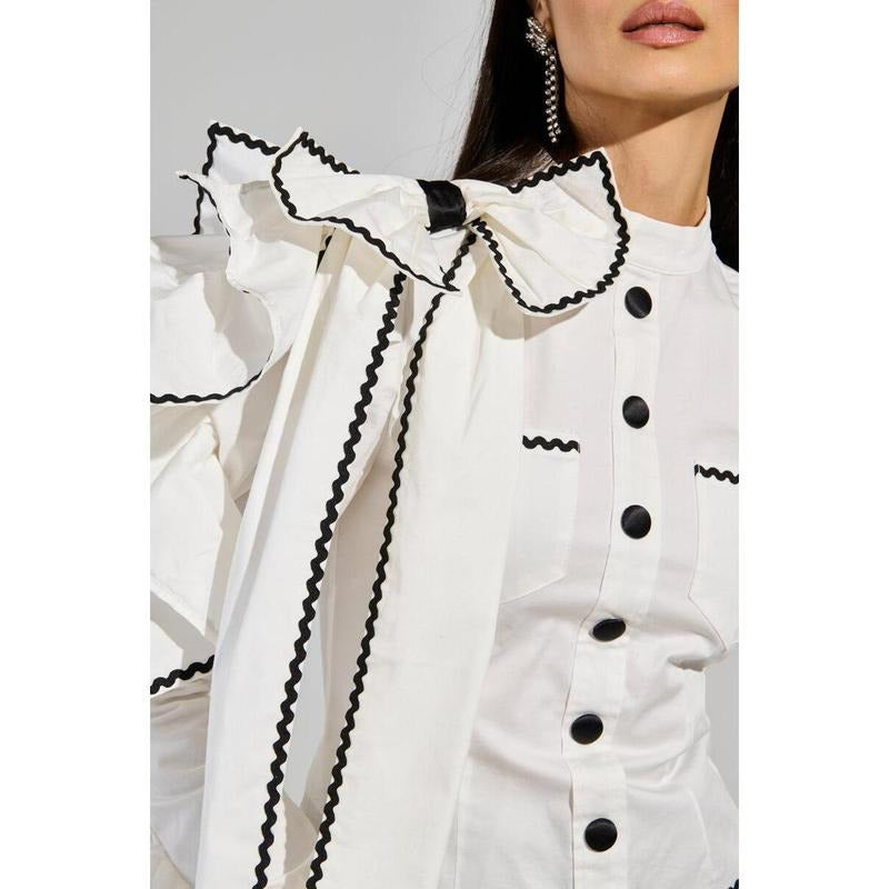 BRING THE DRAMA POPLIN BOW TOP